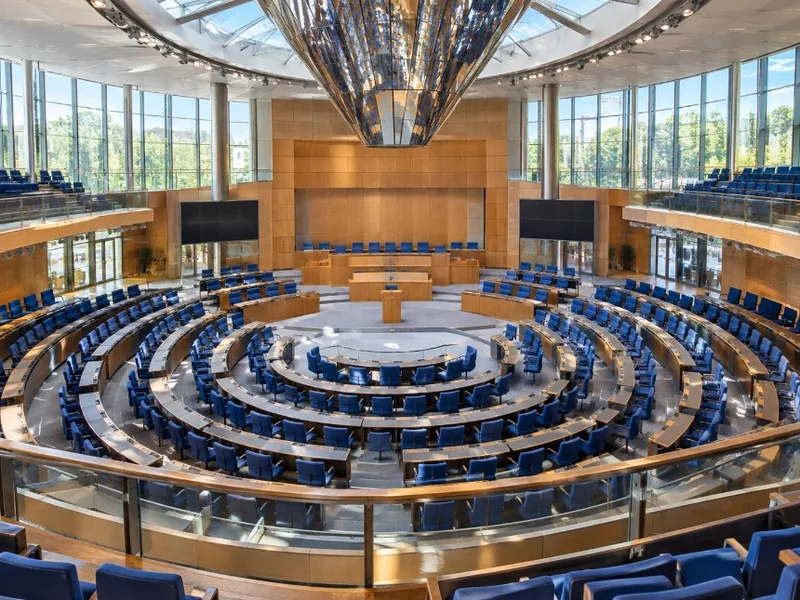 Plenary chamber talk, dome and Spree riverbank